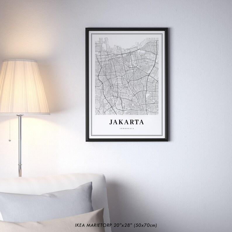 May include: Black and white map print of Jakarta, Indonesia in a black frame. The print is 20 inches by 28 inches (50x70 cm).