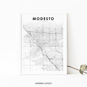May include: A black and white map of Modesto, California, with the city name and state printed at the top. The map shows the street layout of the city. The text "MODERN LAYOUT" is printed at the bottom of the map.