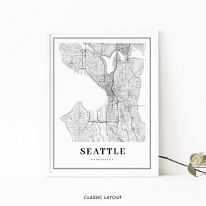 May include: Black and white map print of Seattle, Washington. The map shows the city streets and waterways. The text "Seattle, Washington" is printed below the map.