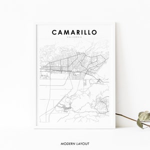 May include: A black and white map print of Camarillo, California. The map shows the city's streets and roads. The text "CAMARILLO" and "CALIFORNIA" is printed at the top of the map. The text "MODERN LAYOUT" is printed at the bottom of the map.