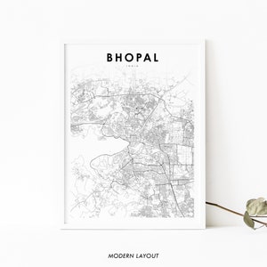 May include: A black and white city map print of Bhopal, India. The map shows the city's streets and landmarks. The title "Bhopal, India" is printed at the top of the map. The words "Modern Layout" are printed at the bottom of the map.