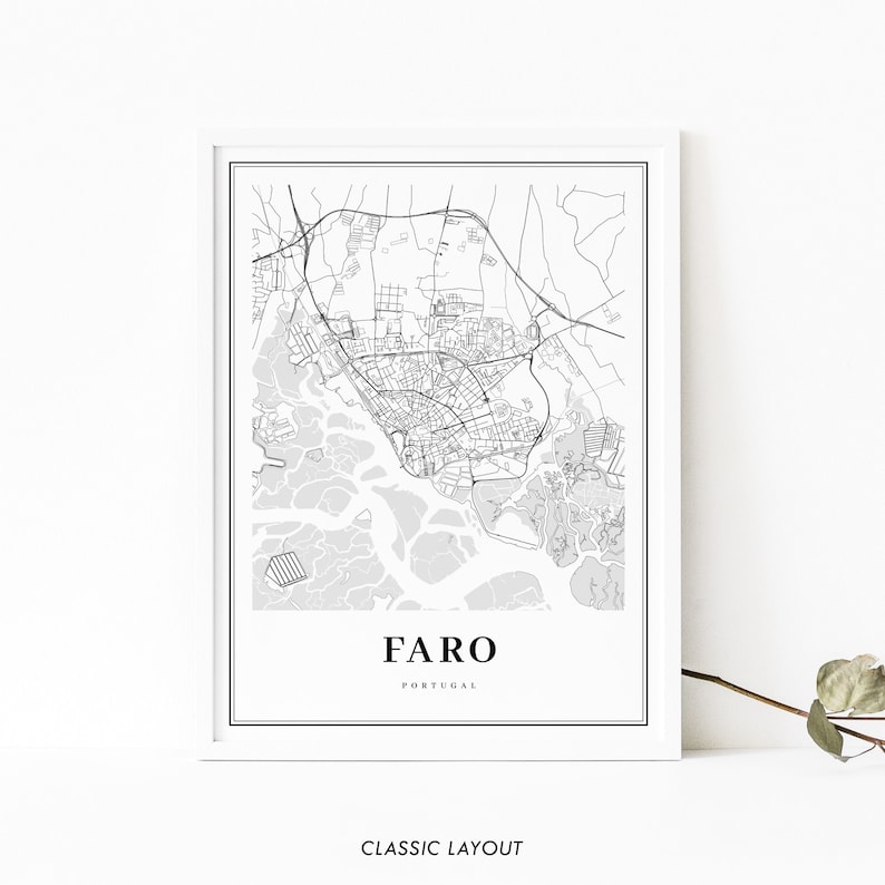 May include: A black and white map print of Faro, Portugal. The map shows the city's streets and waterways. The city name "Faro" and "Portugal" are printed below the map.