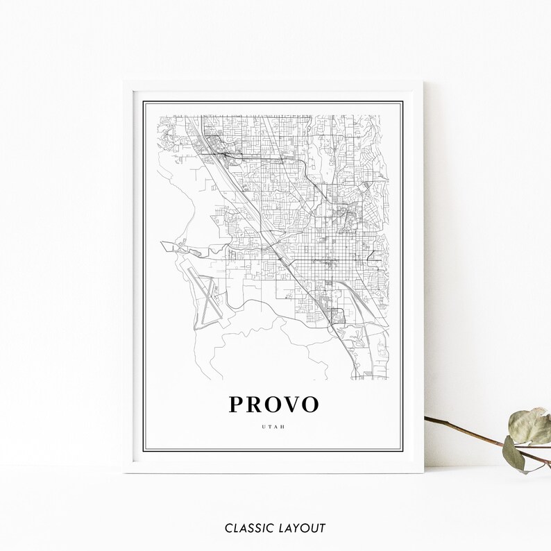 May include: A black and white map print of Provo, Utah. The map shows the city streets and landmarks. The city name is printed in bold at the bottom of the map.