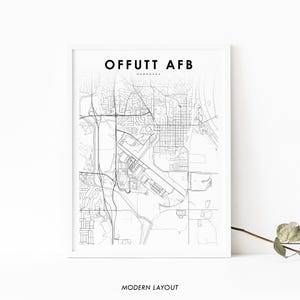 May include: A black and white map print of Offutt AFB, Nebraska. The map shows the layout of the airbase and surrounding area.