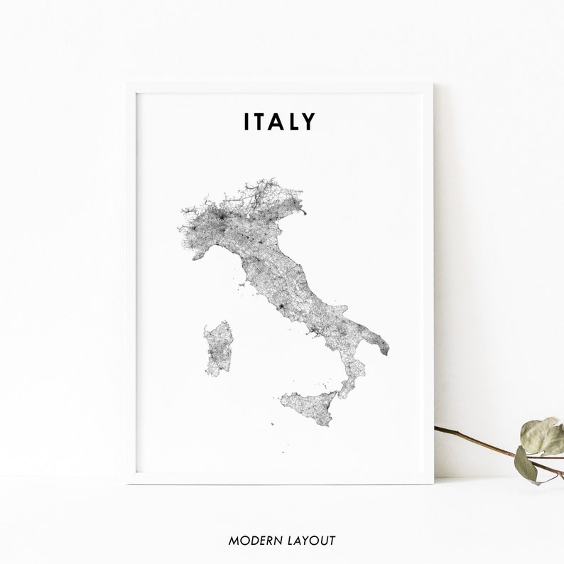 May include: A black and white line art map of Italy with the word "ITALY" printed in black at the top of the map. The map is framed in a white frame and the words "MODERN LAYOUT" are printed in black at the bottom of the image.