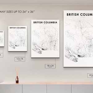 May include: A white wall with four black and white prints of maps of British Columbia, Canada. The prints are framed and hanging on the wall. The prints are available in four sizes: 8x10 inches, 12x16 inches, 18x24 inches, and 24x36 inches.