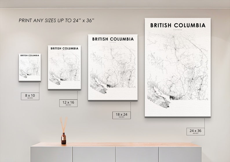 May include: A white wall with four black and white prints of maps of British Columbia, Canada. The prints are framed and hanging on the wall. The prints are available in four sizes: 8x10 inches, 12x16 inches, 18x24 inches, and 24x36 inches.