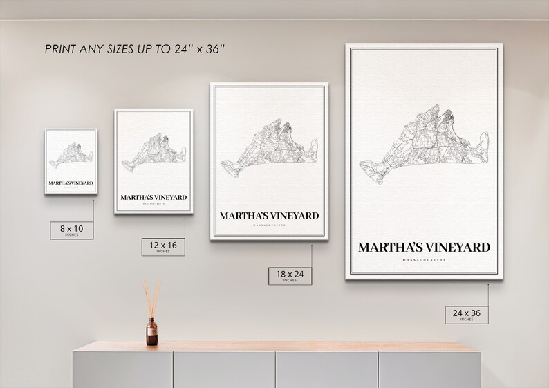 May include: A white wall with four framed prints of a black and white map of Martha's Vineyard, Massachusetts. The prints are available in four sizes: 8x10 inches, 12x16 inches, 18x24 inches, and 24x36 inches.