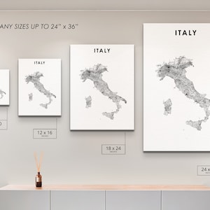 May include: Four different sizes of a black and white print of a map of Italy. The print is available in 8x10 inches, 12x16 inches, 18x24 inches, and 24x36 inches.