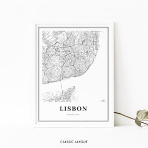 May include: Black and white map print of Lisbon, Portugal. The map shows the city's streets and landmarks. The text "LISBON" and "PORTUGAL" is printed below the map.