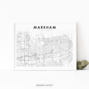 May include: Black and white map print of Markham, Ontario, Canada. The map shows the city's street grid and features a modern layout.