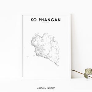 May include: A black and white line art map of Ko Phangan, Thailand, with the name "KO PHANGAN" and "THAILAND" printed in black text above the map. The text "MODERN LAYOUT" is printed in black text below the map.