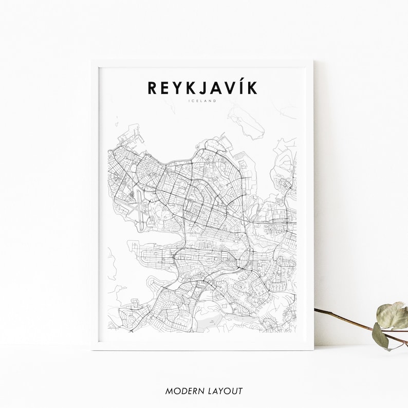 May include: Black and white line art map of Reykjavik, Iceland. The map shows the city's streets and waterways. The title "REYKJAV&Iacute;K" and "ICELAND" are printed above the map. The text "MODERN LAYOUT" is printed below the map.