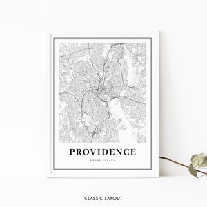 May include: A black and white map print of Providence, Rhode Island. The map shows the city streets and waterways. The city name and state are printed below the map.