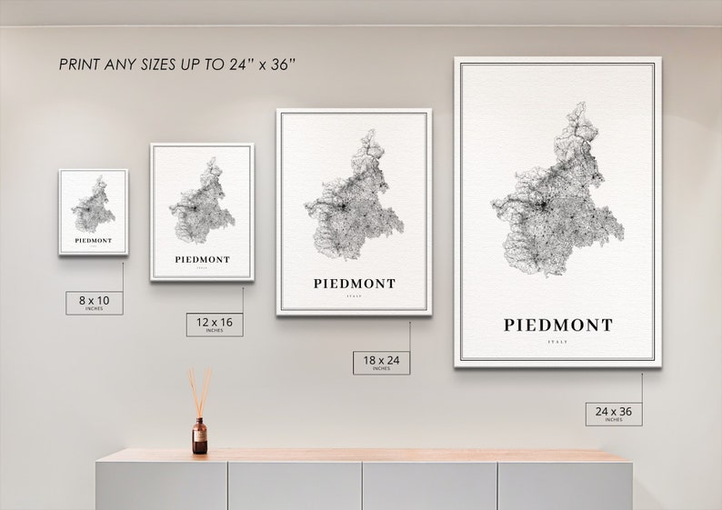 May include: A set of four black and white framed prints of a map of Piedmont, Italy. The prints are shown in different sizes: 8x10 inches, 12x16 inches, 18x24 inches, and 24x36 inches.