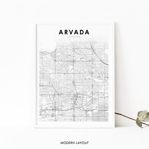 May include: A black and white map of Arvada, Colorado, with the city name and state printed at the top. The map shows the streets and roads of the city. The text "MODERN LAYOUT" is printed at the bottom of the map.