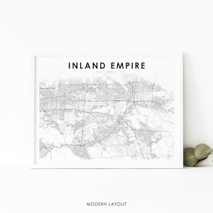 May include: A black and white map print of the Inland Empire region of California. The map shows the major roads and cities in the area. The title "Inland Empire, California" is at the top of the map. The words "Modern Layout" are at the bottom of the map.