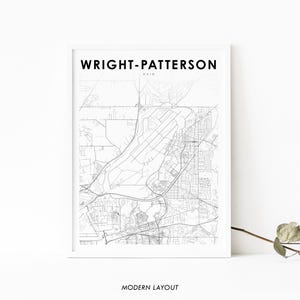 May include: A black and white map print of Wright-Patterson, Ohio. The map shows the city streets and the surrounding area. The text "Wright-Patterson, Ohio" and "Modern Layout" are printed below the map.