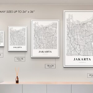 May include: Four framed black and white maps of Jakarta, Indonesia, displayed on a wall. The maps are in different sizes: 8x10 inches, 12x16 inches, 18x24 inches, and 24x36 inches. The text "PRINT ANY SIZES UP TO 24" x 36" is at the top of the image.
