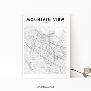 以下が含まれることがあります： カリフォルニア州マウンテンビューの白黒地図プリント。地図には、市の通りとランドマークが表示されています。地図の上部には「マウンテンビュー、カリフォルニア」というテキストがあります。地図の下部には「モダンレイアウト」というテキストがあります。