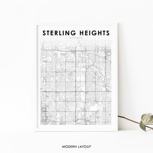 May include: A black and white map print of Sterling Heights, Michigan. The map shows the city's streets and neighborhoods. The title "STERLING HEIGHTS" and "MICHIGAN" are printed at the top of the map. The words "MODERN LAYOUT" are printed at the bottom of the map.