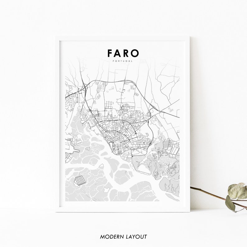 May include: A black and white line art map of Faro, Portugal. The map shows the city's streets, waterways, and landmarks. The title "Faro, Portugal" is printed at the top of the map. The words "Modern Layout" are printed at the bottom of the map.