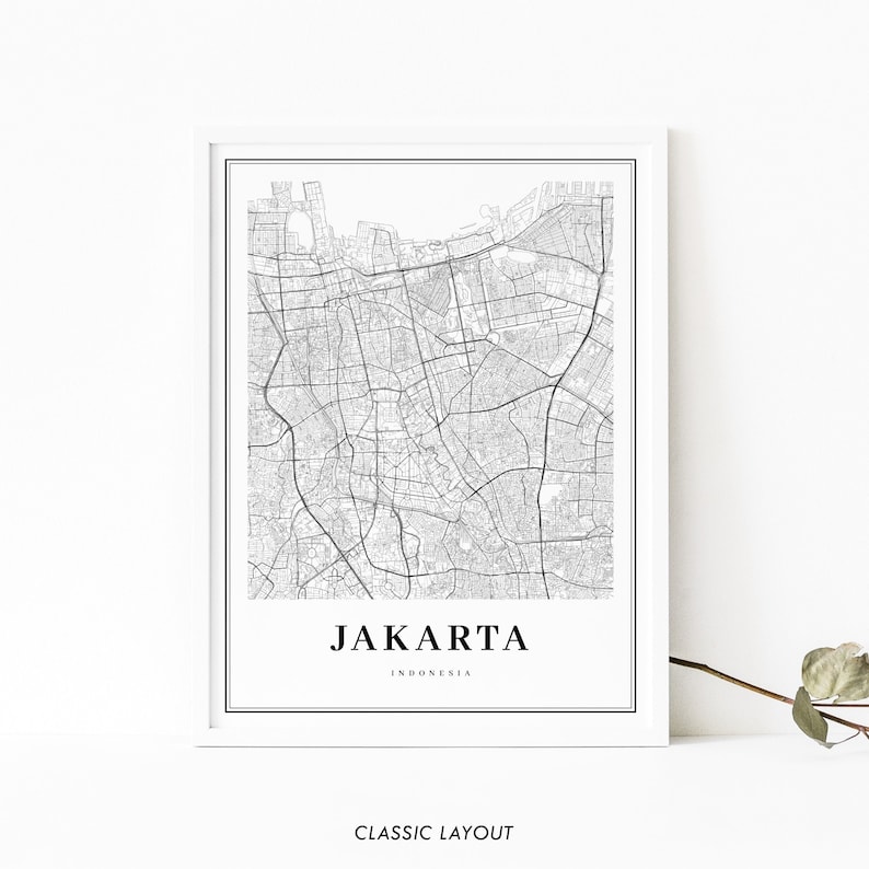 May include: Black and white map print of Jakarta, Indonesia. The map shows the city's streets and landmarks. The text "JAKARTA" and "INDONESIA" is printed below the map.