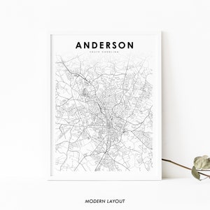May include: A black and white map print of Anderson, South Carolina. The map shows the city's streets and roads. The text "Anderson, South Carolina" and "Modern Layout" are printed below the map.