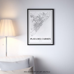 May include: Black and white map print of Playa del Carmen, Mexico, in a black frame. The print is 20 inches by 28 inches (50 cm by 70 cm).
