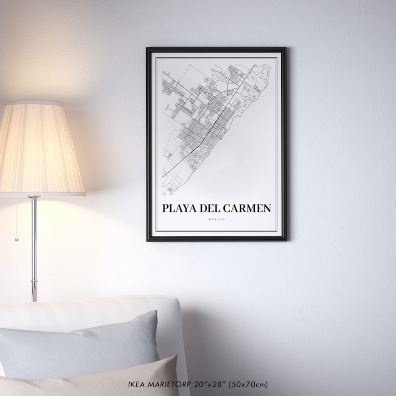 May include: Black and white map print of Playa del Carmen, Mexico, in a black frame. The print is 20 inches by 28 inches (50 cm by 70 cm).