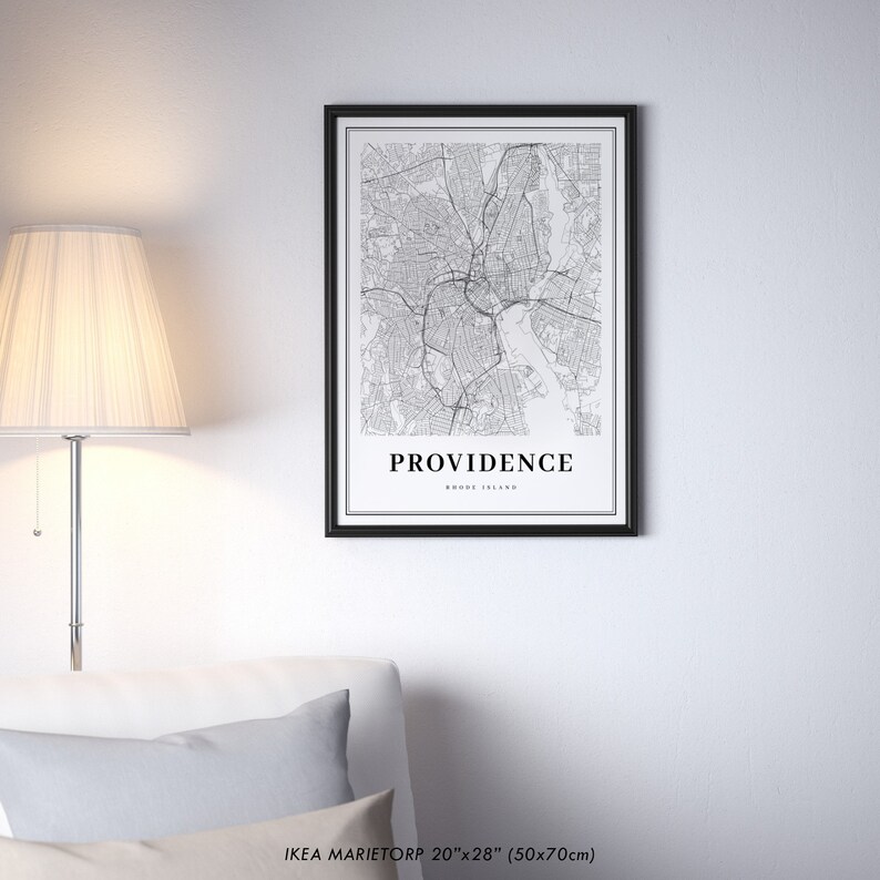 May include: Black and white map print of Providence, Rhode Island, in a black frame. The print is 20 inches by 28 inches (50 cm by 70 cm).
