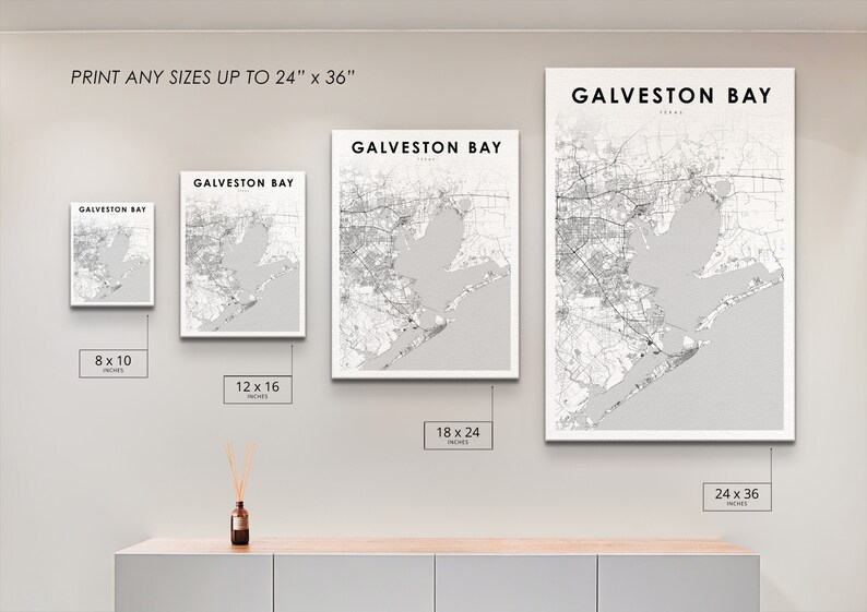 May include: A wall display showing different sizes of a black and white map print of Galveston Bay, Texas. The print sizes are 8x10 inches, 12x16 inches, 18x24 inches, and 24x36 inches. The text "PRINT ANY SIZES UP TO 24" x 36" is at the top of the image.