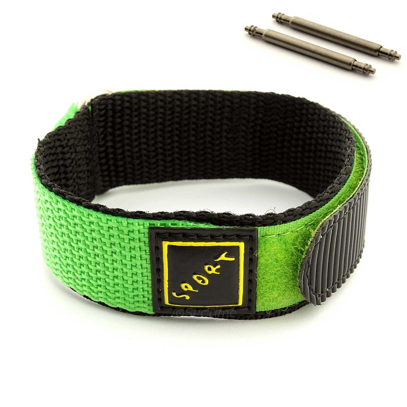 May include: Green and black nylon watch strap with a velcro closure. The strap has a black label with the word "SPORT" in yellow lettering.