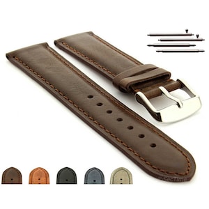 May include: Brown leather watch strap with contrasting stitching and a silver buckle. The strap is shown with spring bars for easy installation.