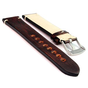 May include: A brown leather watch strap with white stitching and a silver buckle. The strap has a distressed look and is designed for a watch with a 20mm lug width.