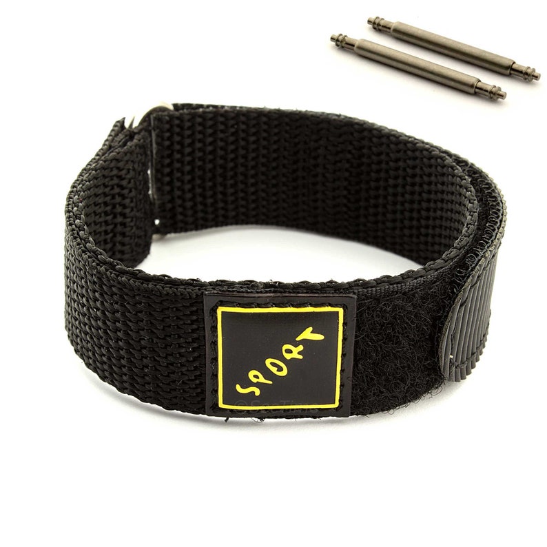 May include: Black nylon watch strap with a velcro closure and a black rectangular patch with the word "SPORT" written in yellow.