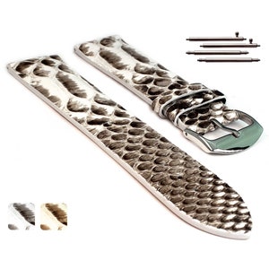 May include: White leather watch strap with a snakeskin pattern. The strap has a silver buckle and comes with spring bars.