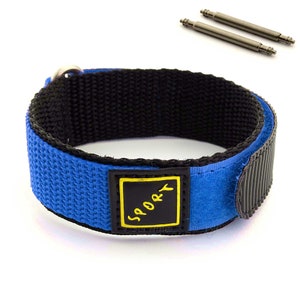 May include: Blue nylon watch strap with black stitching and a velcro closure. The strap has a yellow label with the word "SPORTY" printed in black.