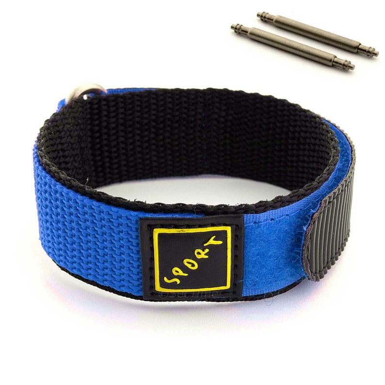 May include: Blue nylon watch strap with black stitching and a velcro closure. The strap has a yellow label with the word "SPORTY" printed in black.