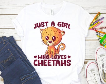 May include: White t-shirt with a cartoon cheetah and the text "Just a girl who loves cheetahs".