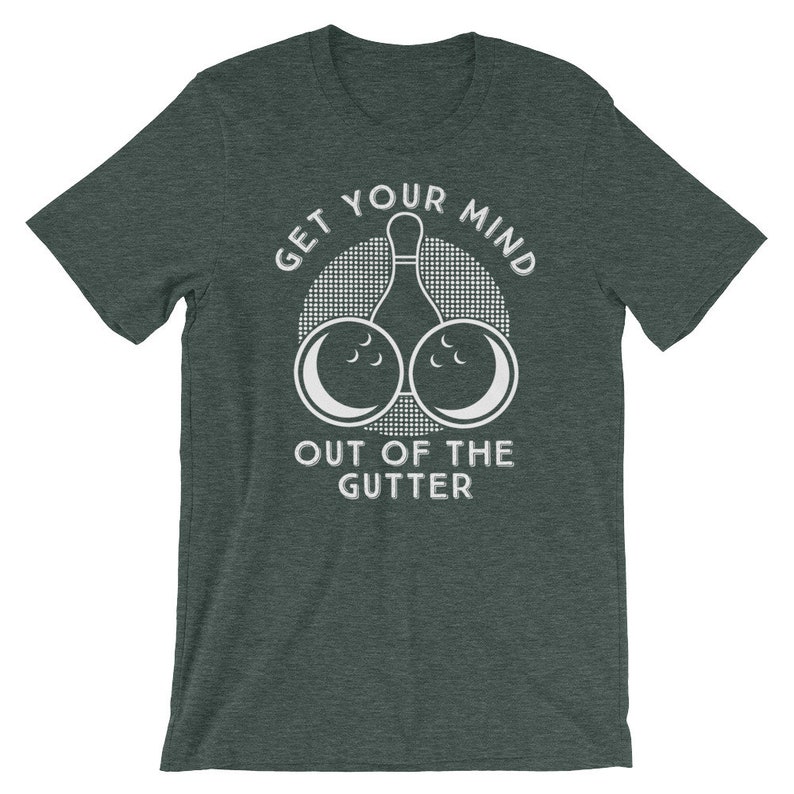 May include: A dark green t-shirt with a white graphic design. The graphic features a bowling pin with two bowling balls on either side of the pin. The text "Get Your Mind Out Of The Gutter" is printed on the shirt.