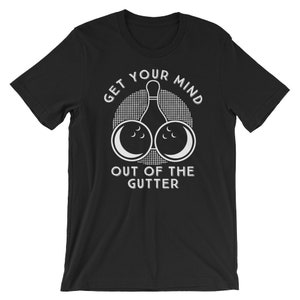 May include: Black t-shirt with a white graphic of a bowling pin and two bowling balls. The text "Get your mind out of the gutter" is printed on the shirt.