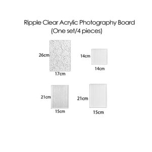 May include: Set of four clear acrylic photography boards in different sizes and textures. The boards measure 26cm x 17cm, 14cm x 14cm, 21cm x 15cm, and 21cm x 15cm.
