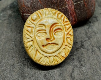 Handmade glazed ceramic sun brooch
