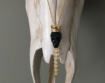 Black Swarovski Skull with gold crown and gold tassels necklace