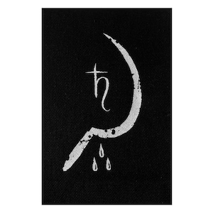 May include: A black patch with a white stylized image of a sickle and hammer with a cross and the letter 'h' inside the hammer. Three white drops are dripping from the sickle.
