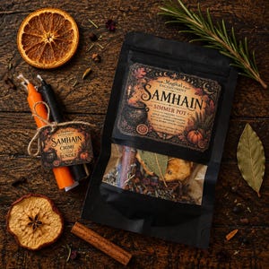 May include: A black pouch labeled Magikal Enchantment Samhain Simmer Pot containing dried ingredients, paired with a bundle of orange and black chime candles featuring a matching tag, surrounded by a dried orange slice, rosemary, and a bay leaf.