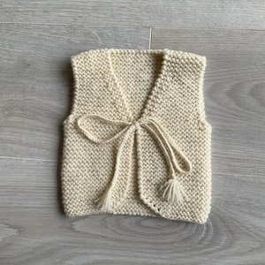Baby sleeveless vest, shepherd&#39;s vest in pure 100% merino wool, hand-knitted, made to order, 28 colors to choose from