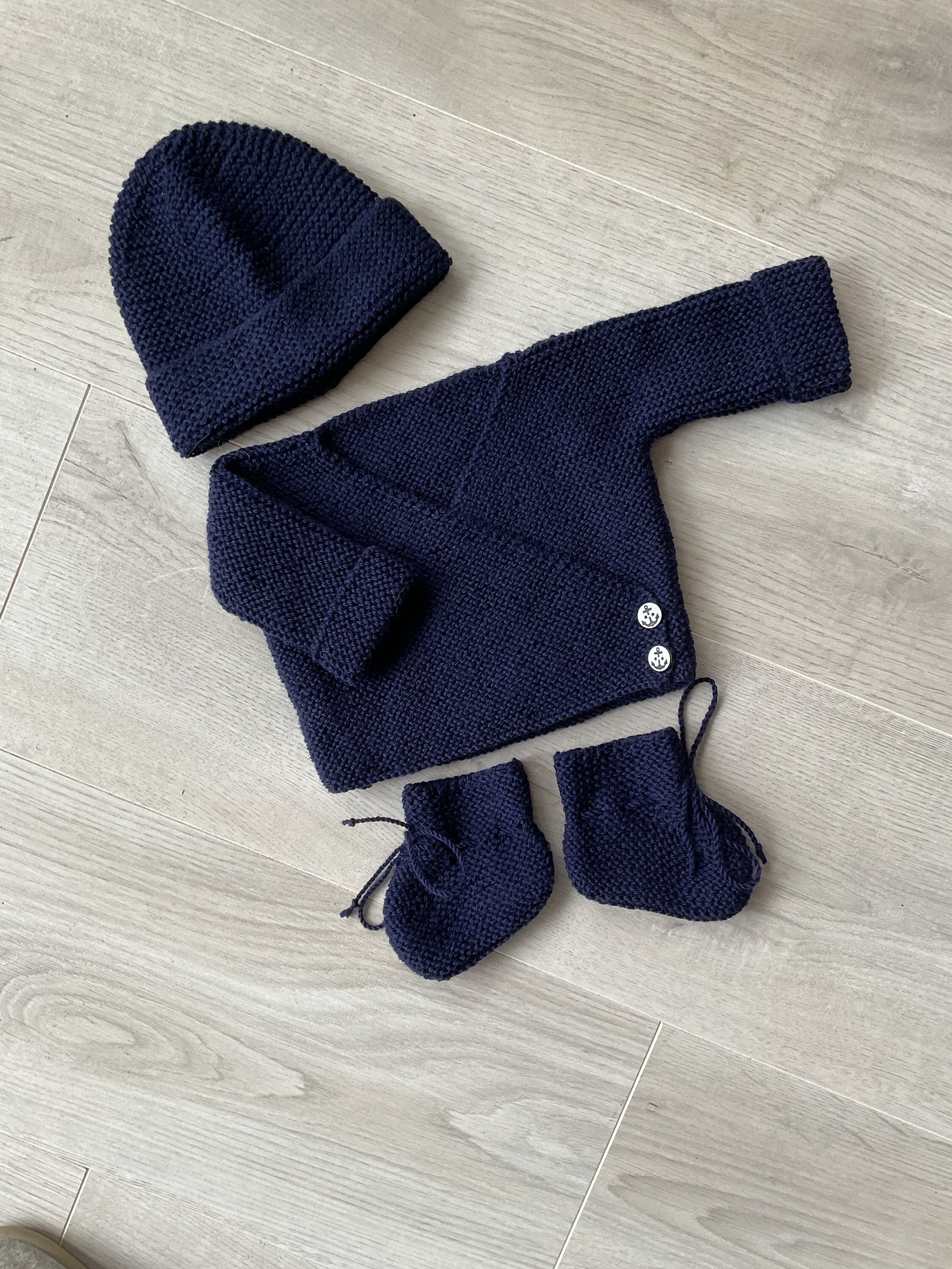 Handmade Knitted Newborn Set, for Baby Boy. Stock Photo - Image of romper,  background: 184492362
