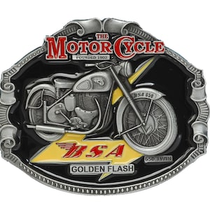 May include: A silver belt buckle with a black background featuring a vintage motorcycle with the text "The Motor Cycle Founded 1903" and "BSA Golden Flash 650 Twin" in red and yellow.
